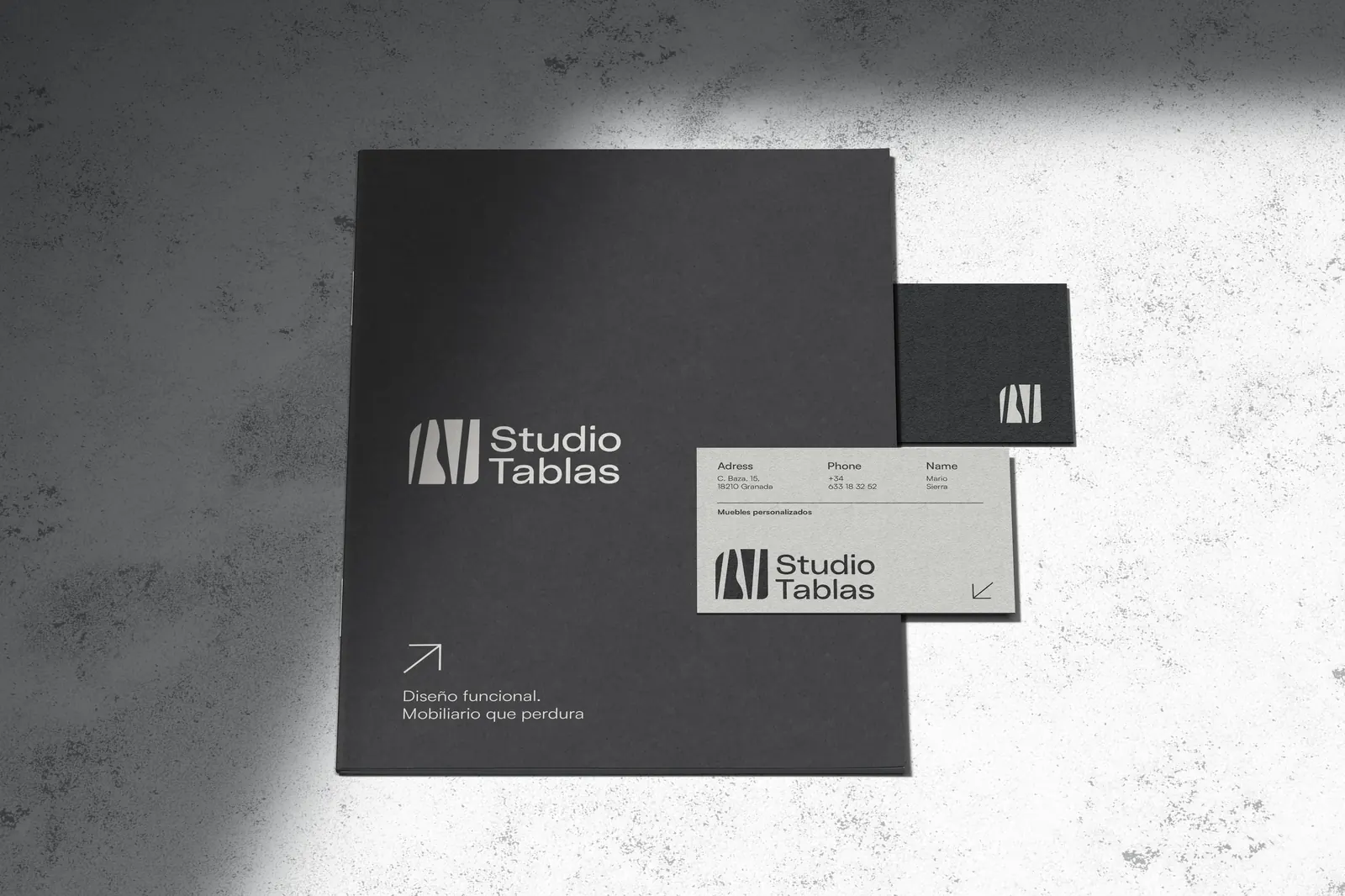 Studio Tablas folder and cards on concrete