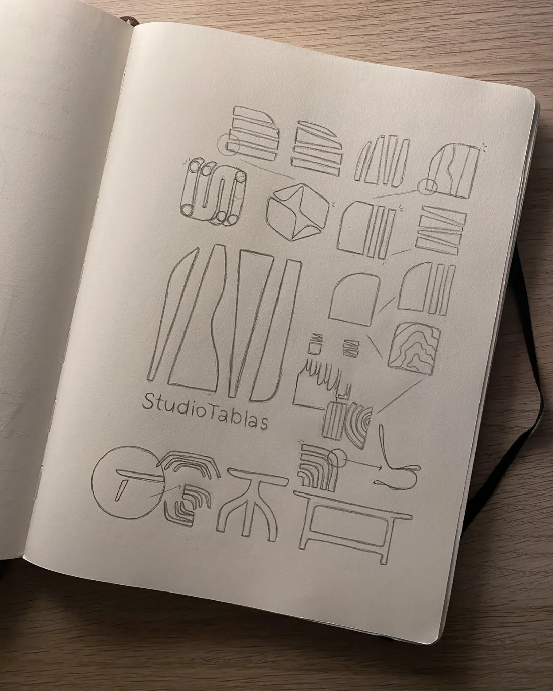 Notebook with the sketches of the Studio Tablas symbol