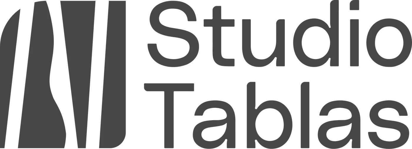 Studio Tablas logo: the four-plank symbol with the grain and the name on two lines
