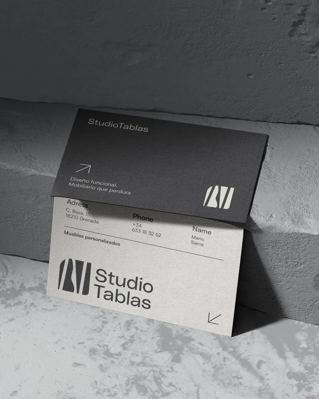 Studio Tablas cards leaning on a concrete block