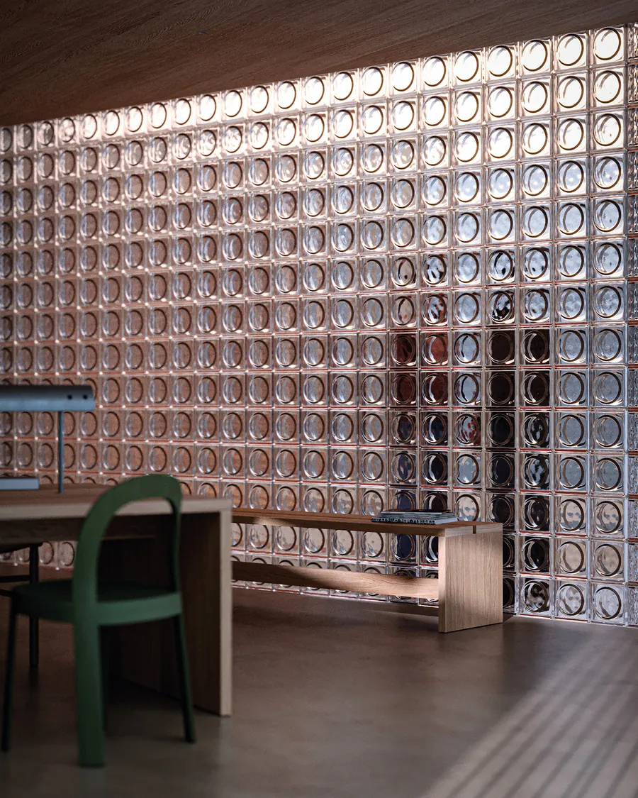 Render 3D de pocoestudio: pared de pavés de vidrio con una silla verde