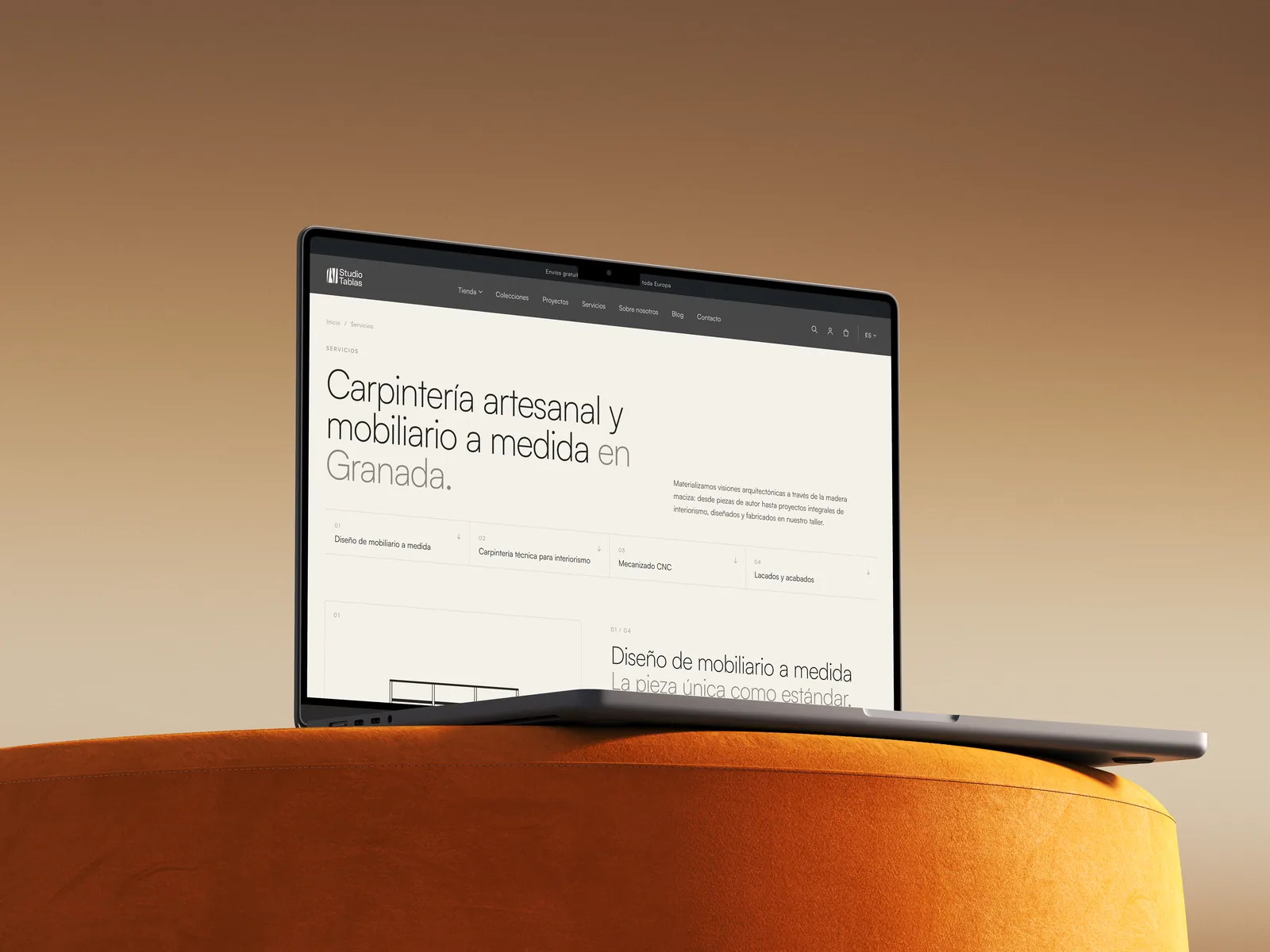 Studio Tablas services page on a laptop: craft joinery and custom furniture in Granada